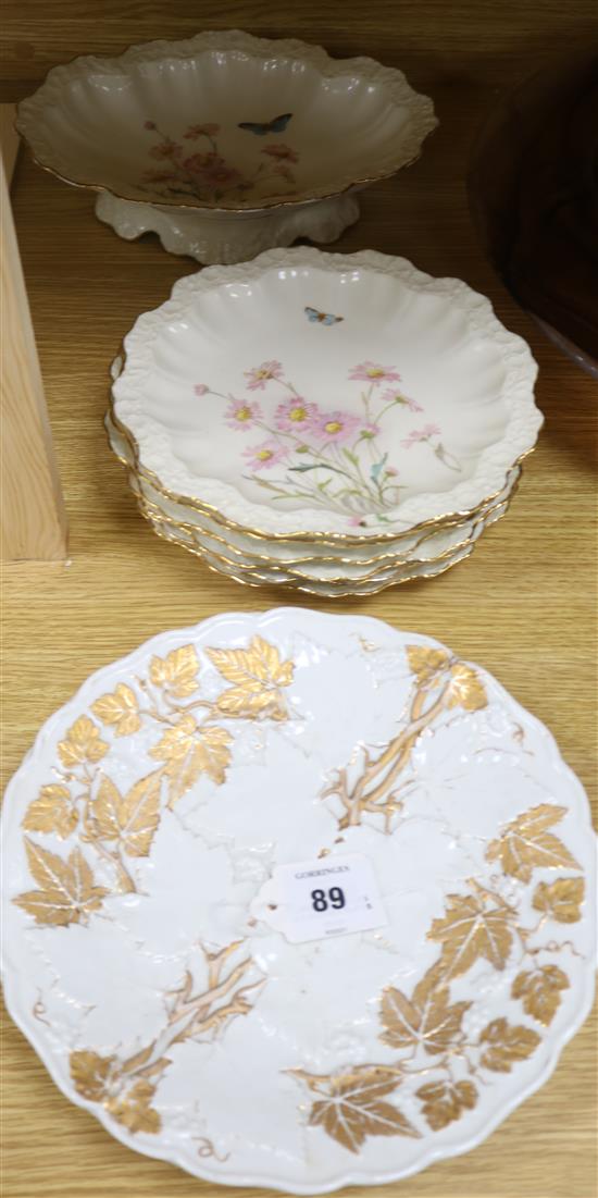 A Limoges dessert service and two Meissen gilt decorated plates